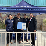 LA City Council District 8 staff and WLCAC Business Service Representative Alphonso Reed present a certificate of appreciation to Trillum Drivers, a company that recruited candidates at the South LA Job Fair on November 18, 2021